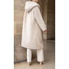 Manteau long écru en fausse fourrure