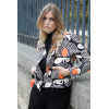 Blouson seventies courbes noir blanc et couleurs